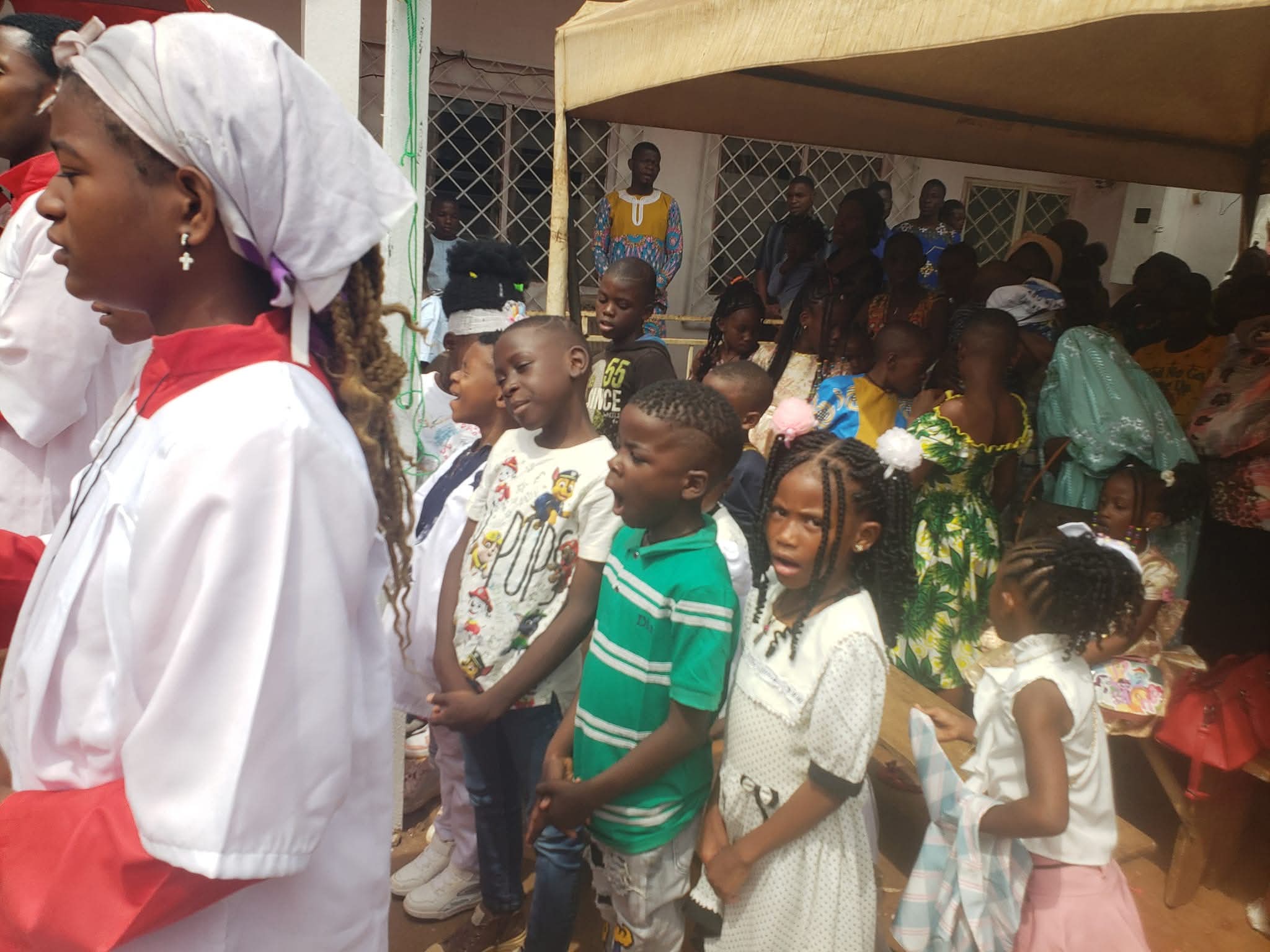 Children and families participating in church life in Cameroon